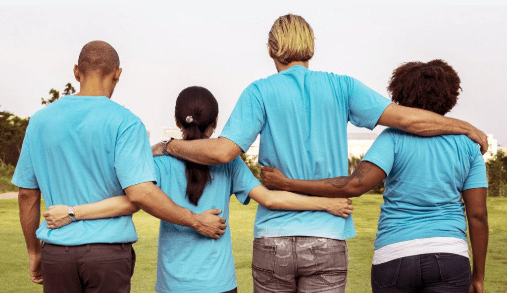 volunteers arm in arm